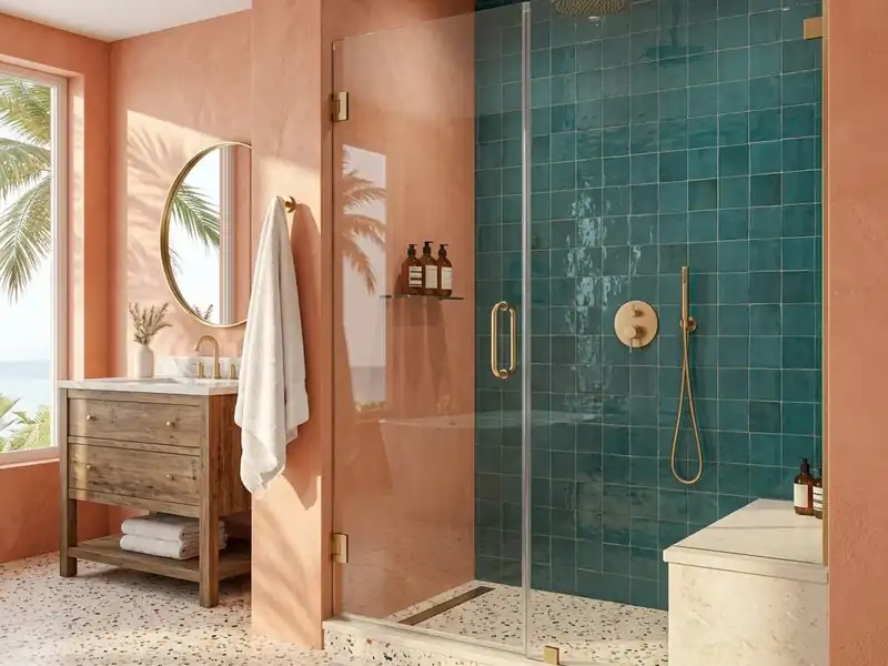 Former bathtub alcove rebuilt as a low threshold glass shower with a tiled bench in white and teal